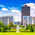A skyline of city buildings behind a city park in Baton Rouge, Louisiana