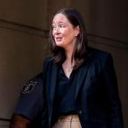 Maurene Comey exiting a building