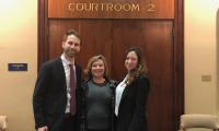 CLC litigators stands outside a Texas courtroom with Texas client 