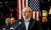 David Bernhardt in front of American flag