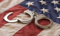 handcuffs on an American flag