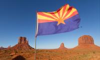 Arizona flag in desert