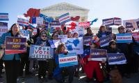 Concerned citizens rally outside the Supreme Court against gerrymandering