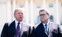 William Barr and President Trump standing next to each other