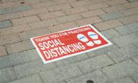 A sign advising social distancing at a polling place in Washington DC.