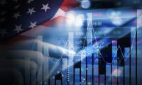 A stock graph and an American flag