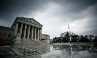 The front of the U.S. Supreme Court under cloudy skies