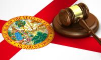 The state flag of Florida with a gavel on top