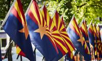 A row of Arizona state flags