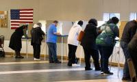 Voters cast their ballots at a polling station in Detroit, Michigan on Tuesday, November 8, 2023. 