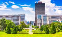 A skyline of city buildings behind a city park in Baton Rouge, Louisiana