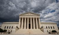 The U.S. Supreme Court building on a cloudy day