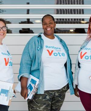 Three organizers for Restore Your Vote Tennessee posing for a photo