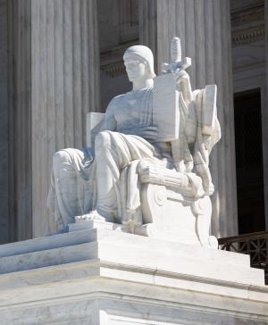 A statue in front of the Supreme Court building