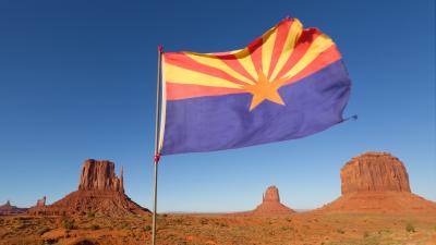 Arizona flag in desert
