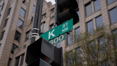 A street sign which says "K St NW"
