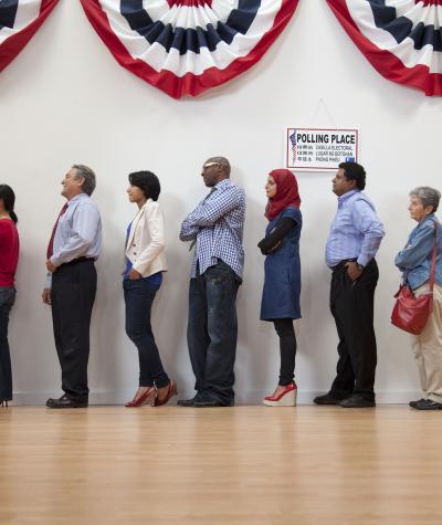 Voters wait in line to cast their ballots.