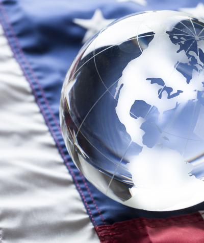 World globe on American flag