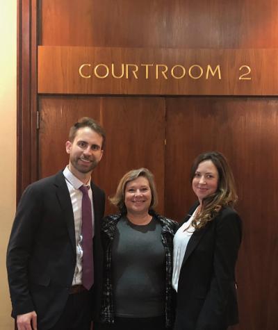 CLC litigators stands outside a Texas courtroom with Texas client 