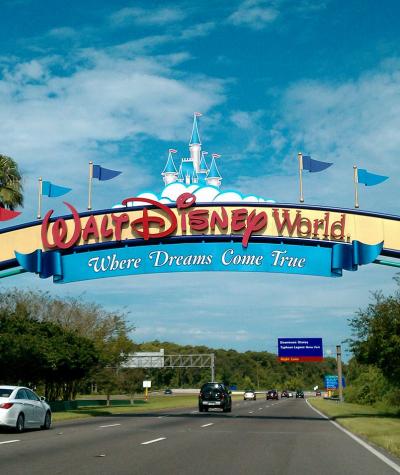 The Disney World sign over a highway