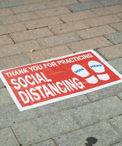 A sign advising social distancing at a polling place in Washington DC.