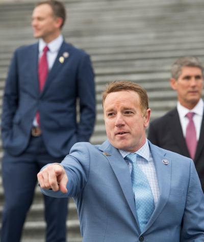 Pat Fallon standing on the steps of the U.S. Capitol pointing towards the camera