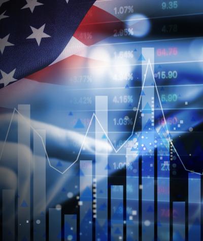 A stock graph and an American flag