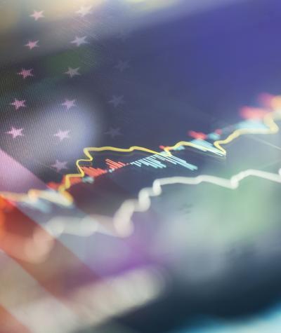 Image of a stock graph overlaid on top of an American flag