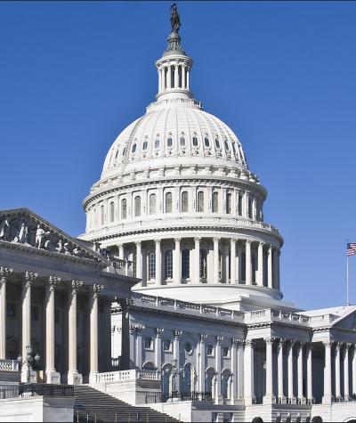 The U.S. Capitol Building against a blue sky