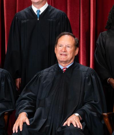 Close-up of Justice Samuel Alito seated in the official Supreme Court portrait