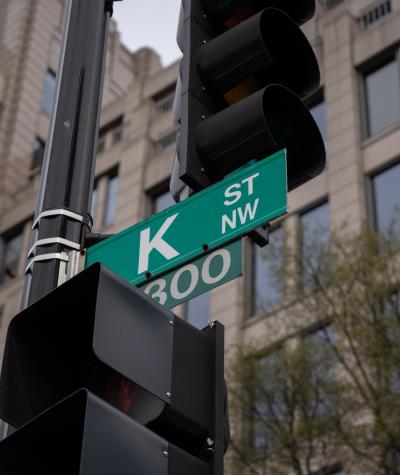 A street sign which says "K St NW"