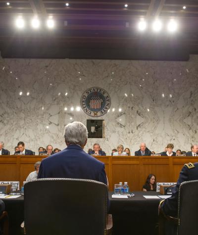 A Senate Foreign Relations Committee hearing, with witnesses sitting at a table before Senators of the committee