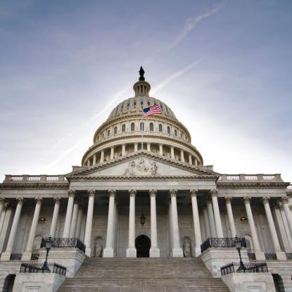 A shot looking up at the front of the U.S. Capitol Building.