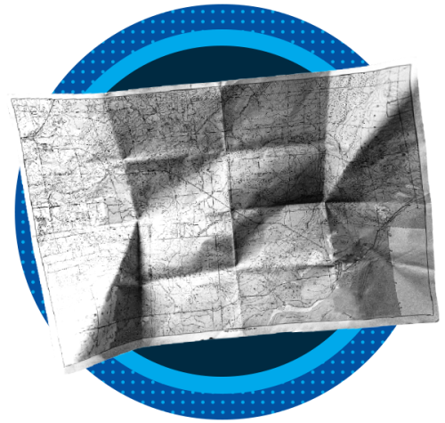 A creased black-and-white topographic road map