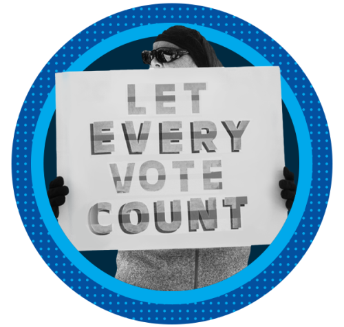 A person in sunglasses holding a hand-lettered "Let Every Vote Count" sign